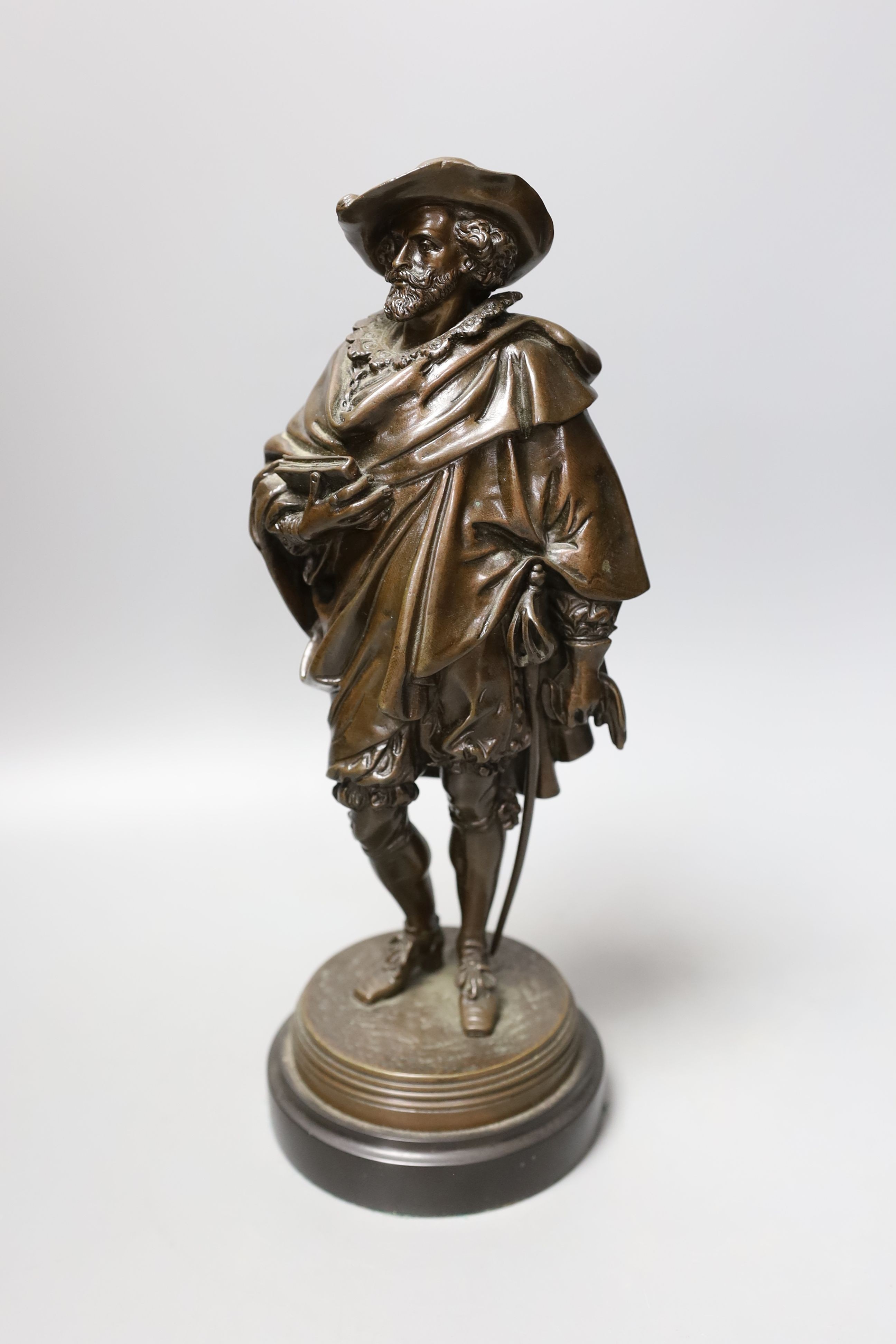 Jean Jules Salmson (1823-1902) a bronze figure of Van Dyck on marble circular base, signed to the base, 30cm(h)